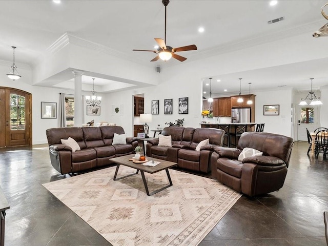 living room featuring ornate columns, ceiling fan, and crown molding