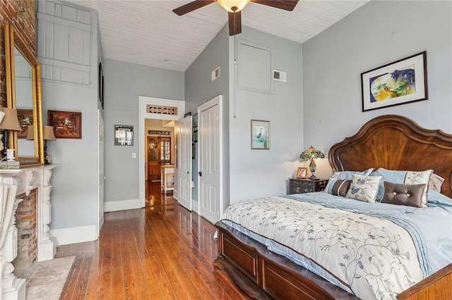 bedroom featuring hardwood / wood-style floors, ceiling fan, and a closet