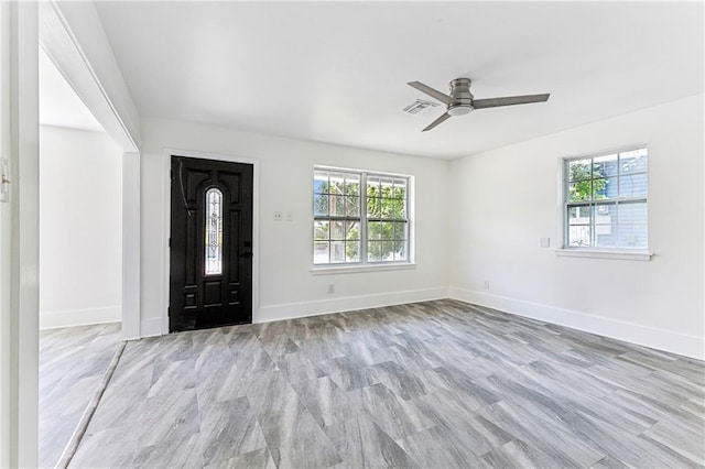 8014 Lucerne St, New Orleans, LA 70128 - entrance foyer with plenty of natural light, ceiling fan, and baseboards