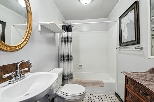 full bathroom featuring shower / bath combination with curtain, toilet, and sink