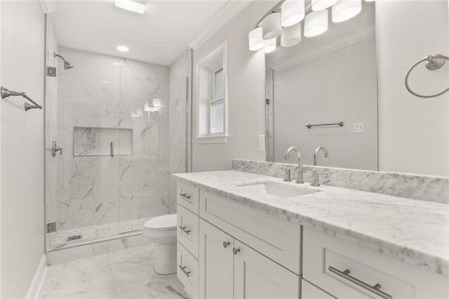 bathroom featuring an enclosed shower, vanity, toilet, and ornamental molding