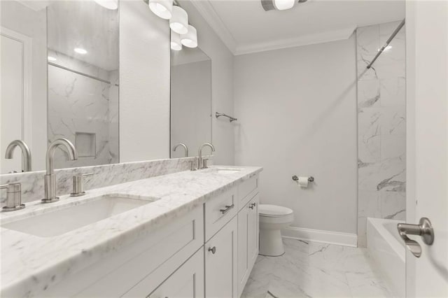 bathroom featuring toilet, vanity, and ornamental molding