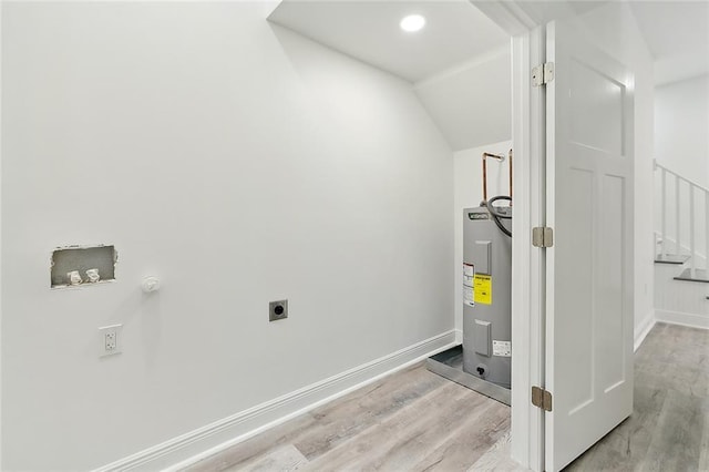 utility room with electric water heater