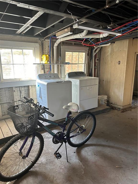 interior space with washing machine and clothes dryer