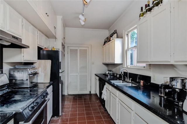 kitchen with sink, dark tile patterned floors, crown molding, white cabinets, and black appliances