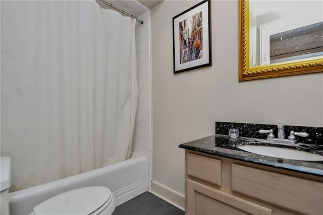 full bathroom featuring vanity, shower / tub combo, and toilet