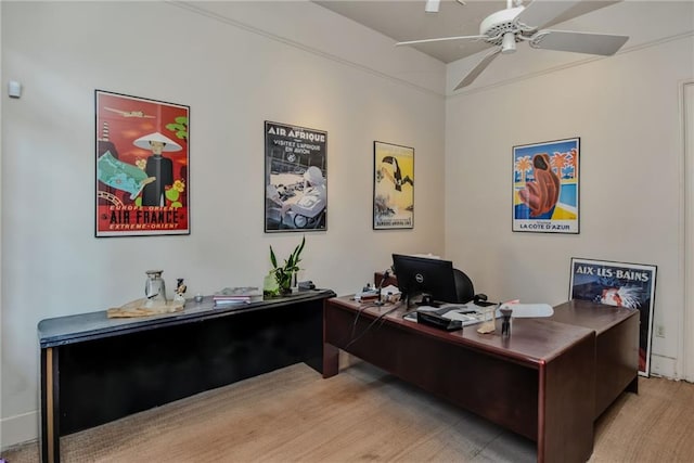 office space with ceiling fan and light hardwood / wood-style floors