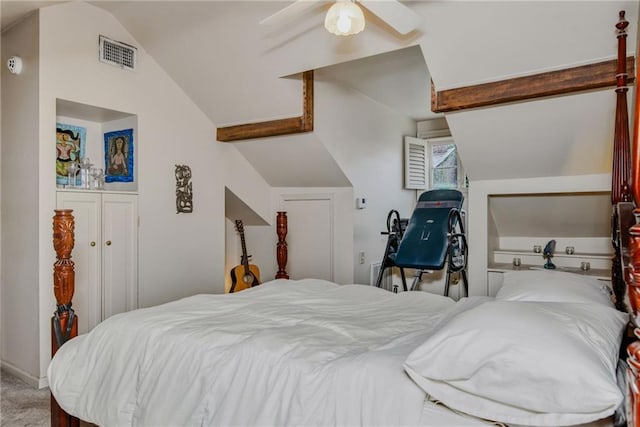 carpeted bedroom with ceiling fan and lofted ceiling