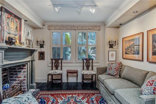 625 Dumaine St, New Orleans, LA 70116 - living area featuring track lighting, a fireplace, and crown molding