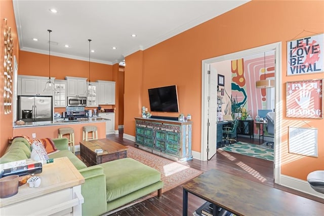 living room with dark wood-type flooring and crown molding