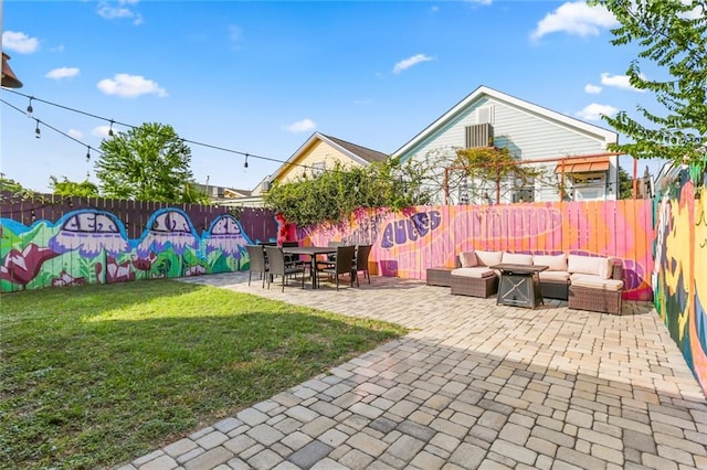 exterior space featuring an outdoor living space and a patio area