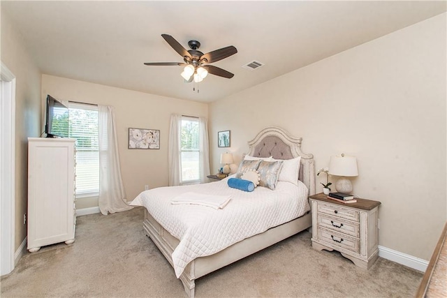 20291 Clemson Way, Ponchatoula, LA 70454 - bedroom featuring light carpet, baseboards, and ceiling fan
