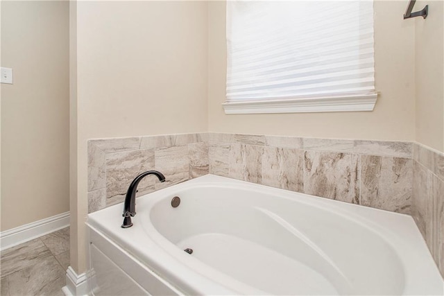 20291 Clemson Way, Ponchatoula, LA 70454 - bathroom with a bath and baseboards
