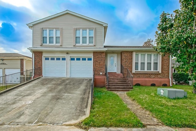 view of front of property with a garage and a front yard