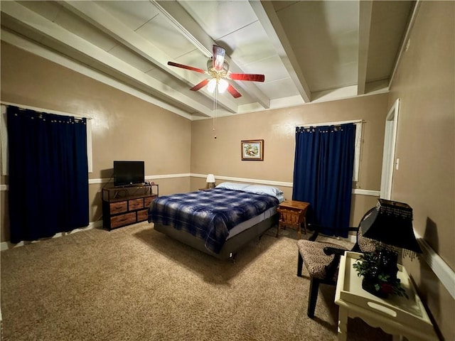 bedroom featuring beam ceiling, ceiling fan, and carpet floors