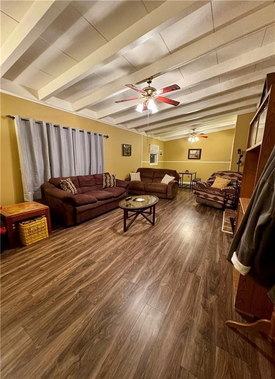 living room with beam ceiling, dark hardwood / wood-style flooring, and ceiling fan