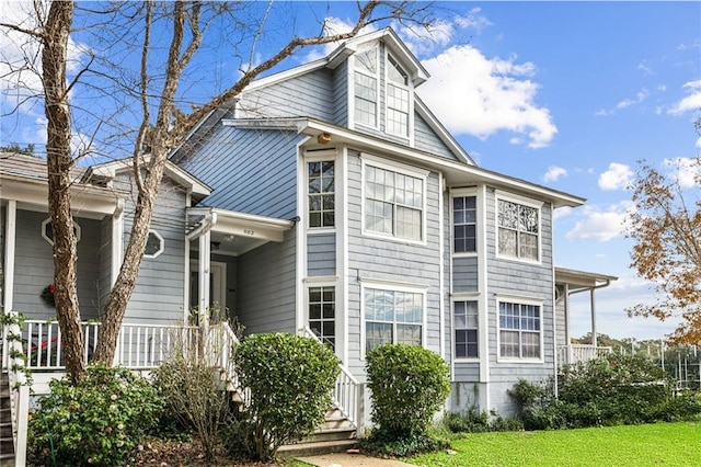 view of home's exterior featuring a yard