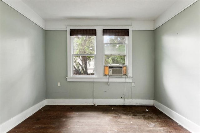 unfurnished room featuring dark wood-type flooring