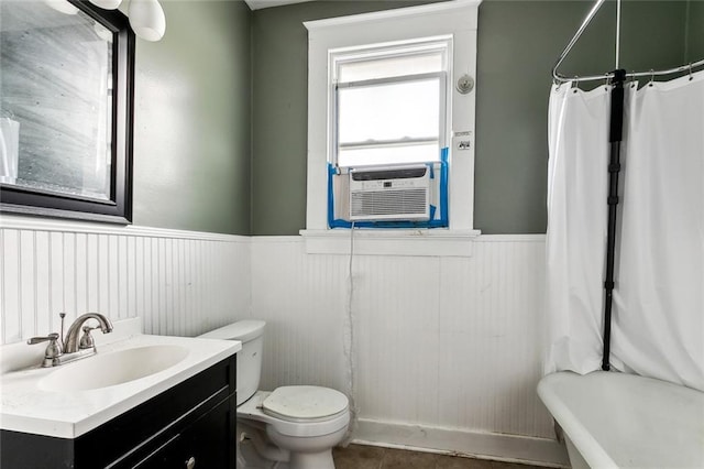 full bathroom with shower / bath combo, vanity, tile patterned floors, cooling unit, and toilet