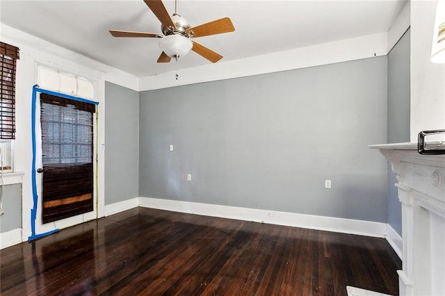 foyer entrance with hardwood / wood-style flooring and ceiling fan