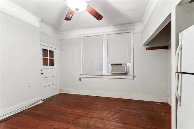 empty room with dark hardwood / wood-style floors, cooling unit, ornamental molding, and ceiling fan