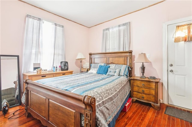 bedroom featuring dark wood-type flooring