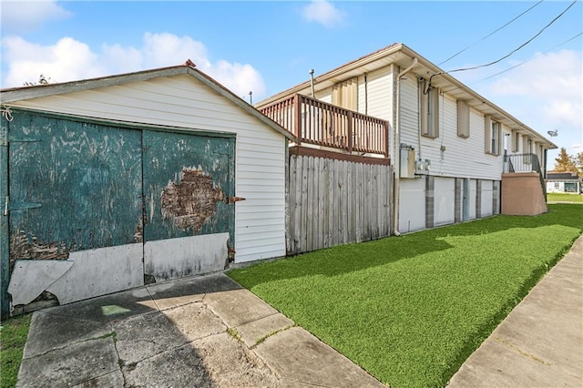 view of home's exterior featuring a lawn