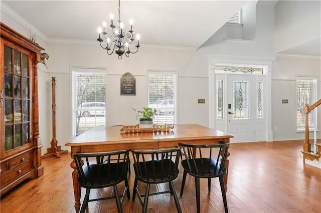 dining room featuring light hardwood / wood-style flooring and a healthy amount of sunlight