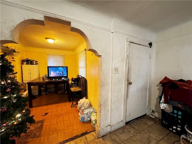 miscellaneous room with tile patterned floors