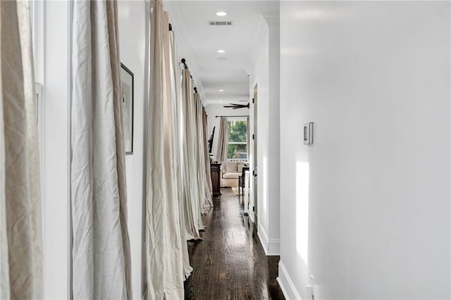 corridor with dark hardwood / wood-style floors