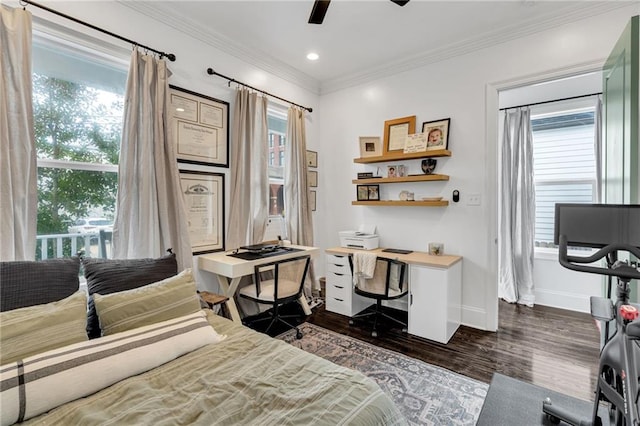 bedroom featuring ceiling fan, dark hardwood / wood-style floors, and ornamental molding