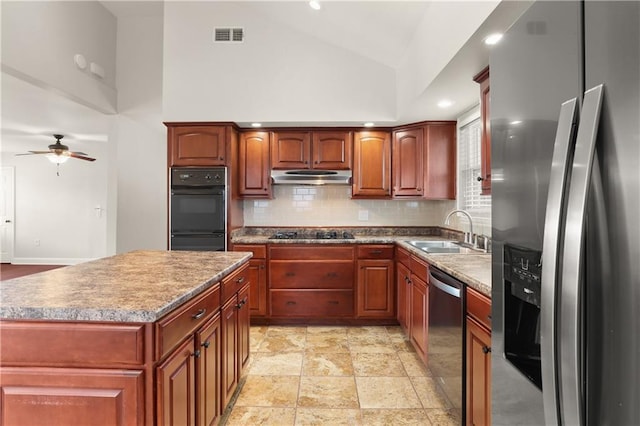 kitchen featuring ceiling fan, sink, a center island, backsplash, and black appliances