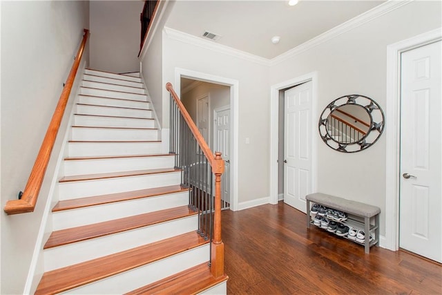 staircase featuring recessed lighting, wood finished floors, visible vents, ornamental molding, and baseboards