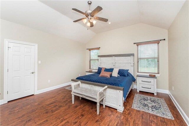 bedroom with baseboards, vaulted ceiling, wood finished floors, and ceiling fan