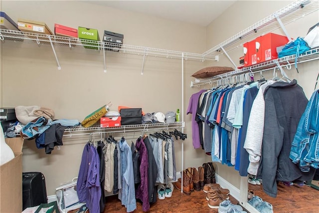 spacious closet with wood finished floors