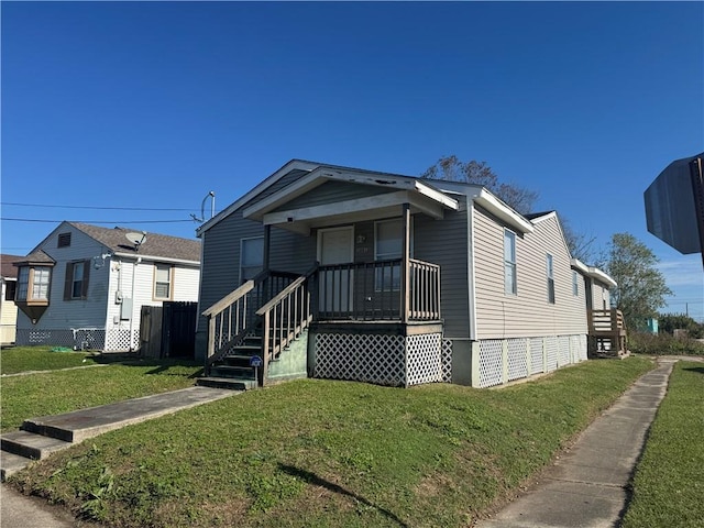 view of front of property with a front lawn