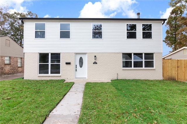 view of property featuring a front yard