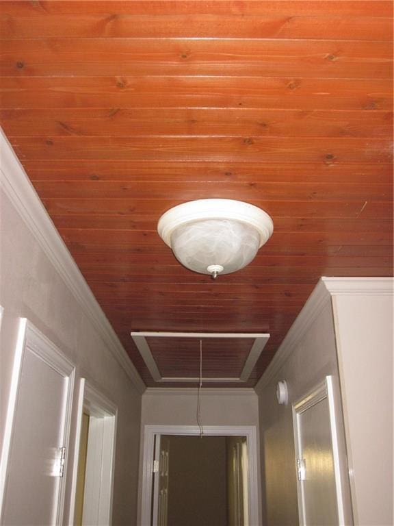 details with crown molding and wooden ceiling