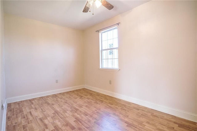 unfurnished room with light hardwood / wood-style flooring and ceiling fan