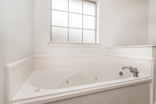 bathroom featuring a bath