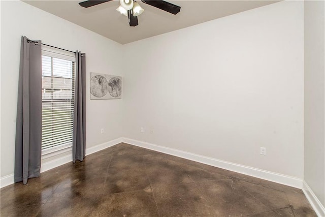 spare room with ceiling fan