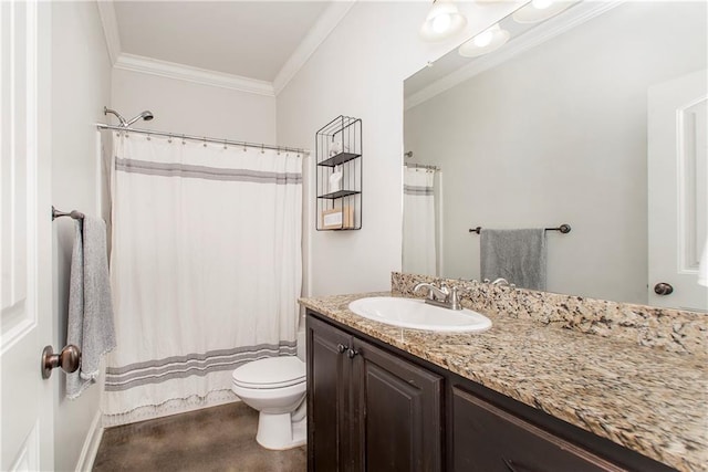 bathroom featuring vanity, toilet, and ornamental molding