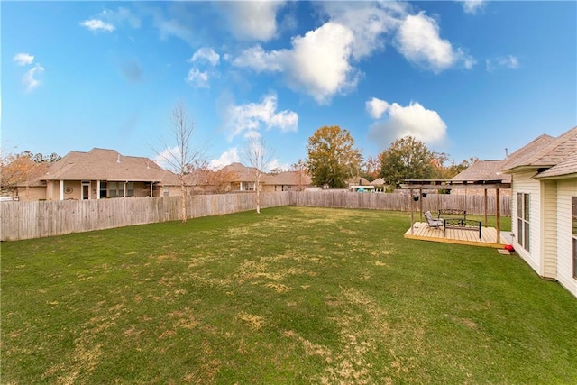 view of yard with a deck