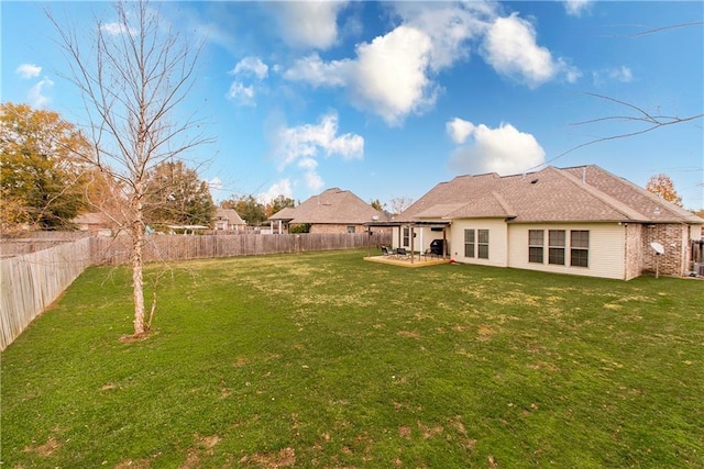 view of yard with a patio area