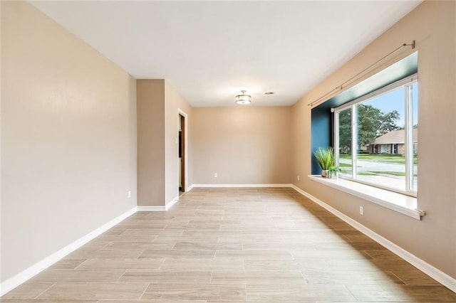 empty room with light wood-type flooring