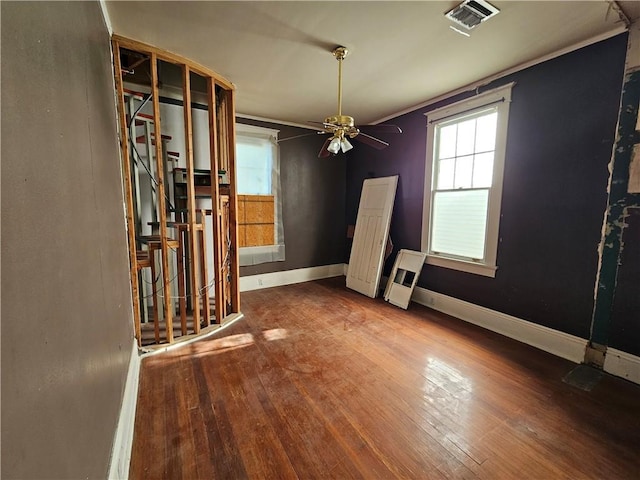 interior space with hardwood / wood-style flooring and ceiling fan