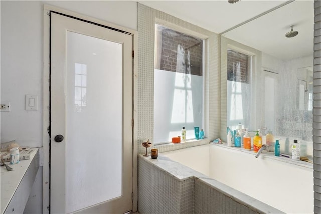 bathroom with separate shower and tub