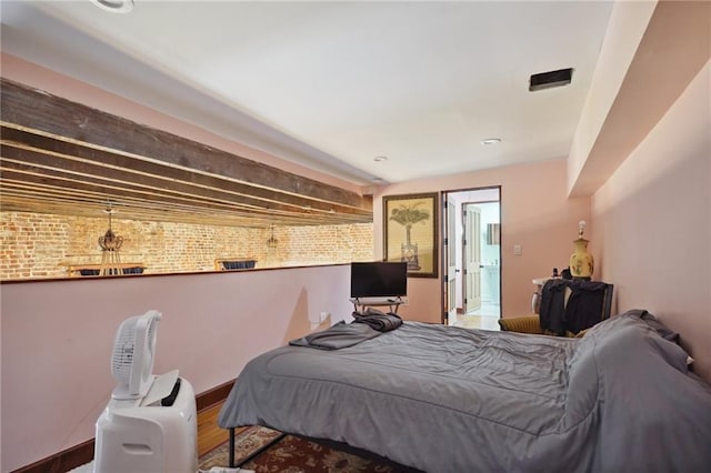 bedroom featuring hardwood / wood-style flooring