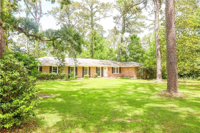 108 N Dr, Covington, LA 70433 - single story home with a front yard and brick siding