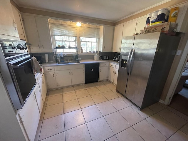 kitchen with white cabinets, black appliances, sink, ornamental molding, and light tile patterned floors